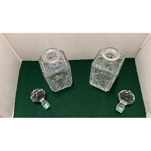 613 - TWO SQUARE WHISKY DECANTERS