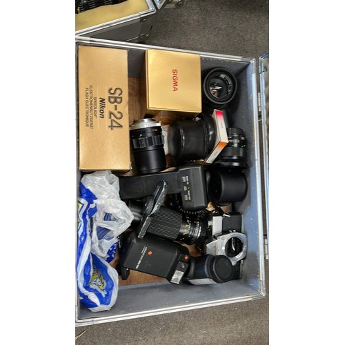 447A - THREE CAMERA CASES WITH CONTENTS OF CAMERAS / LENSES ETC