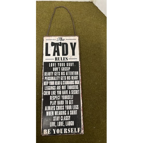 372 - LADY SIGN