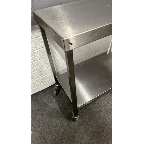 331 - CATERING KITCHEN STAINLESS STEEL MOBILE TABLE