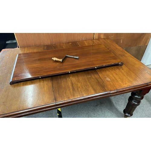 396 - VICTORIAN WIND OUT DINNING TABLE WITH KEY