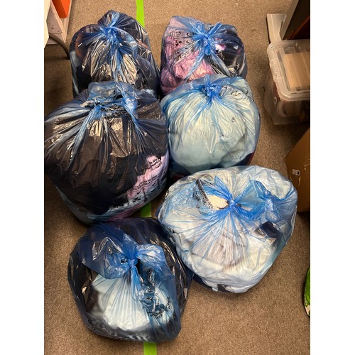 203 - six bags of mixed grade clothes