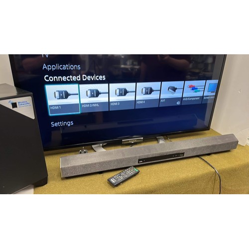 111 - 47 INCH TELEVISION AND SOUND BAR