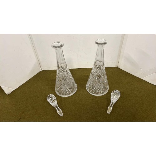 483 - PAIR OF TALL CUT GLASS DECANTERS