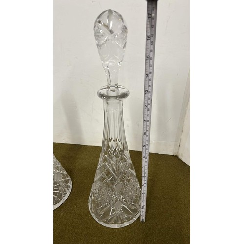 483 - PAIR OF TALL CUT GLASS DECANTERS