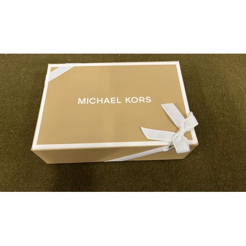 11 - MICHAEL KORS BOXED THE MERCER CLUTCH BAG IN GREY