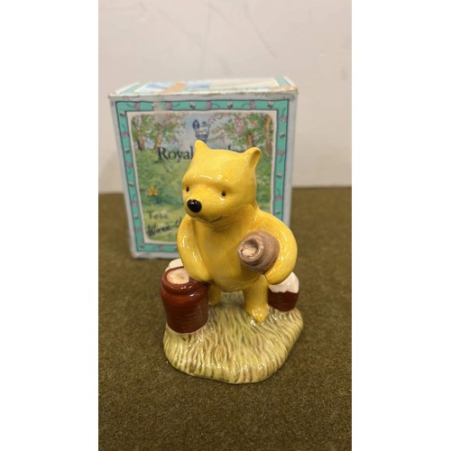 23 - ROYAL DOULTON POOH COUNTING THE HONEY POTS WP12