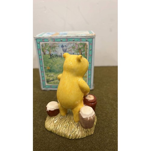 23 - ROYAL DOULTON POOH COUNTING THE HONEY POTS WP12