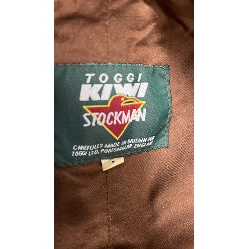 752 - TOGGI KIWI STOCKMAN COAT SIZE LARGE AND OTHER COAT IN BLACK USED /