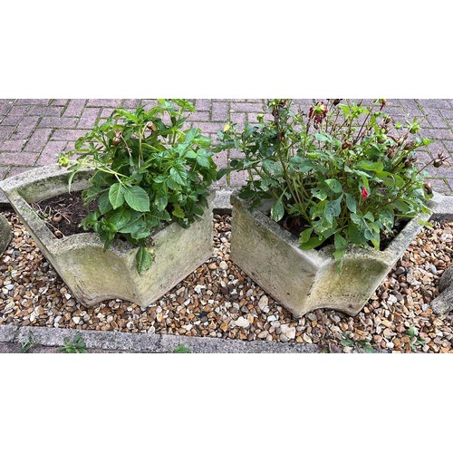 149 - TWO LARGE CORNER PLANTERS WITH FLOWERS