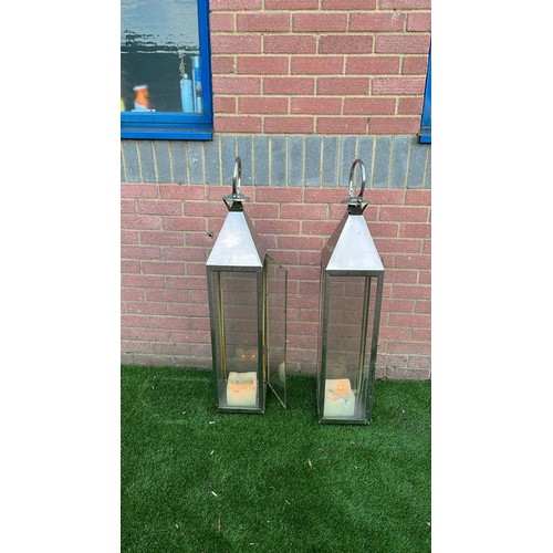 288 - TWO LARGE USED GARDEN CANDLE LANTERNS