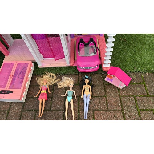 373 - LARGE USED BARBIE DOLLS HOUSE AND DOLLS MIXED SEE ALL PICTURES