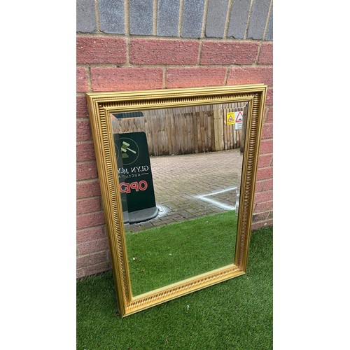 382 - GOLD COLOURED FRAMED MIRROR