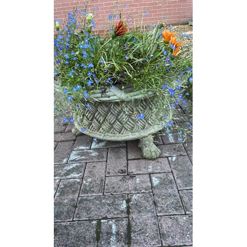 392 - LARGE HEAVY GARDEN PLANTER IN A BASKET STYLE ON FEET WITH FLOWERS