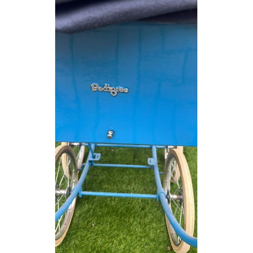 18 - BLUE COACH BUILT PRAM BY PEDIGREE SEE ALL PICTURES