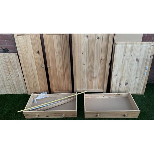 628 - flat packed pine wardrobe