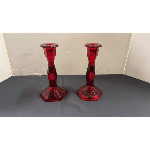 30 - PAIR OF RED GLASS CANDLE STICKS