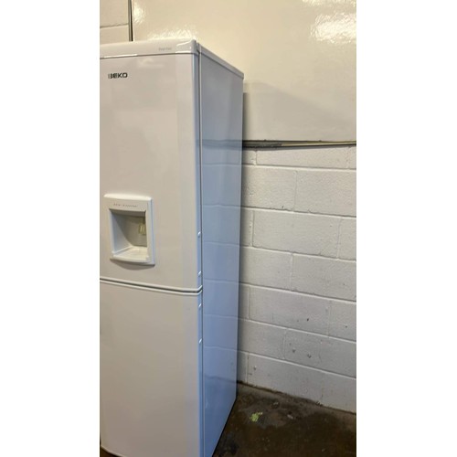 64 - BEKO TALL WHITE FRIDGE / FREEZER HAS A CRACK IN DOOR HANDLE