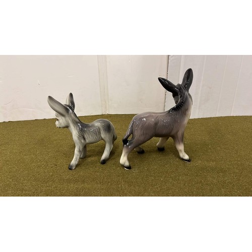 83 - TWO DONKEY FIGURES