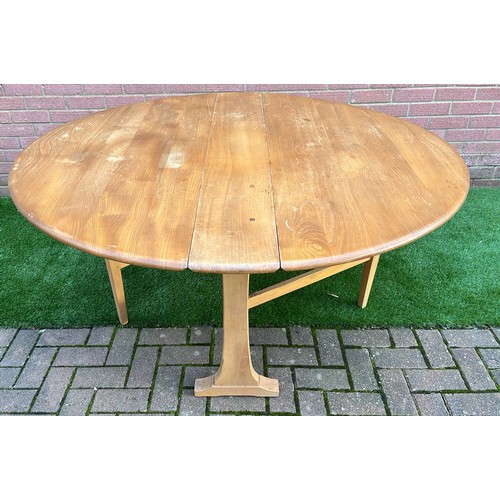 252 - ERCOL LIGHT FINISH DROP LEAF TABLE SEE PICTURES FOR CONDITION OFF MARKS AND A JOINT SPLIT