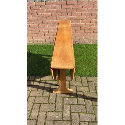 252 - ERCOL LIGHT FINISH DROP LEAF TABLE SEE PICTURES FOR CONDITION OFF MARKS AND A JOINT SPLIT