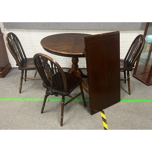 201 - Dinning table with three chairs