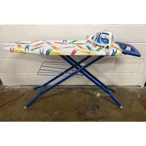 290 - IRONING BOARD AND IRON