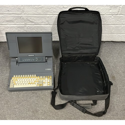 566 - 1980s retro samsung s5200 laptop in case