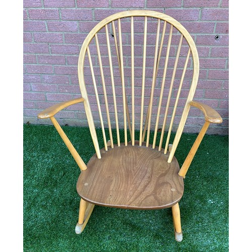 133 - ERCOL LIGHT FINNISH LOW ROCKING CHAIR WITH WARE AND DOG BITES SEE ALL PICTURES