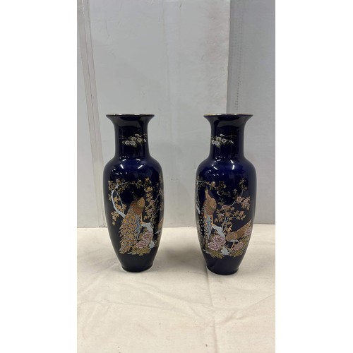 73 - TWO LARGE BLUE ORIENTAL VASES