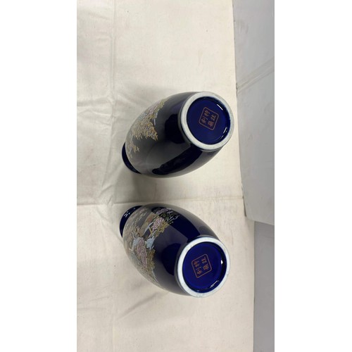 73 - TWO LARGE BLUE ORIENTAL VASES