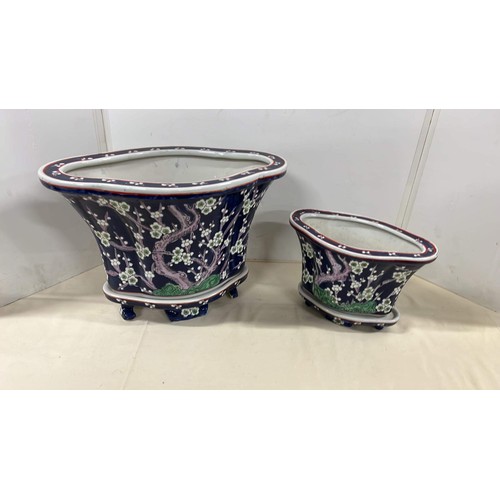 62 - TWO ORIENTAL FLOWER POTS