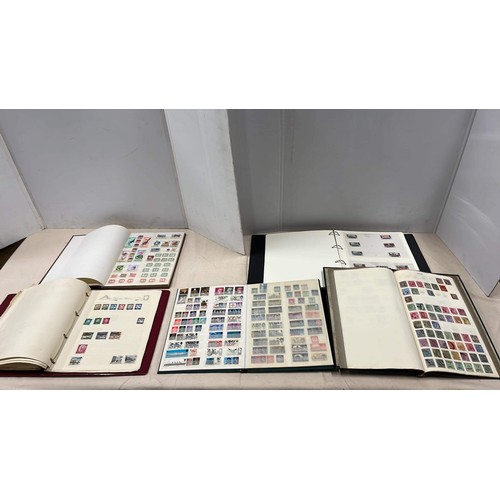 40 - STAMP COLLECTION IN STOCK BOOKS SEE ALL PICTURES