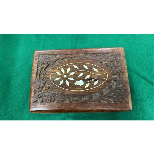 67 - CARVED WOODEN BOX WITH MIXED CHAINS AND PENDANTS