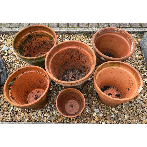 274 - SIX MIXED SIZED TERRACOTTA FLOWER POTS USED