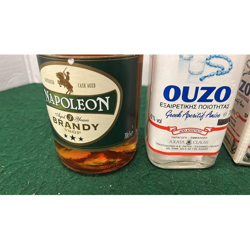 96 - OPEN BOTTLES OF NAPOLEON BRANDY AND OUZO SEE PICTURES / HC