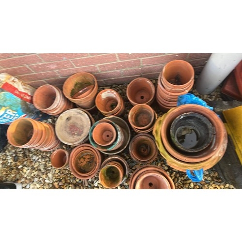 231 - QTY OF USED TERRACOTTA  MIXED SIZED FLOWER POTS