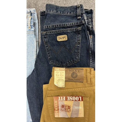 334 - 9 PAIRS OF JEANS IN MIXED COLOURS SIZE 32 WITH TAGS