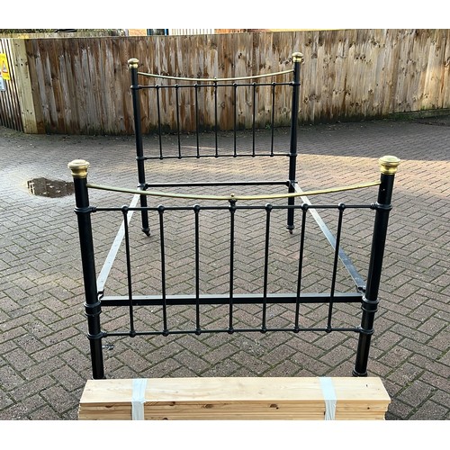 214 - 4ft metal and brass double bed frame