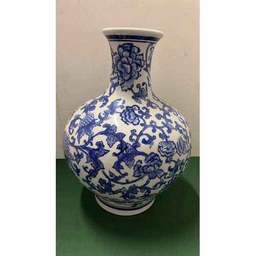 106 - LARGE BLUE AND WHITE VASE