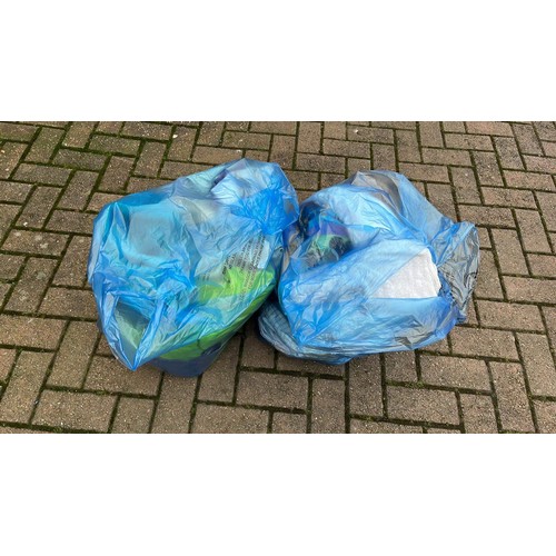 565 - TWO BAGS OF USED TOWELS