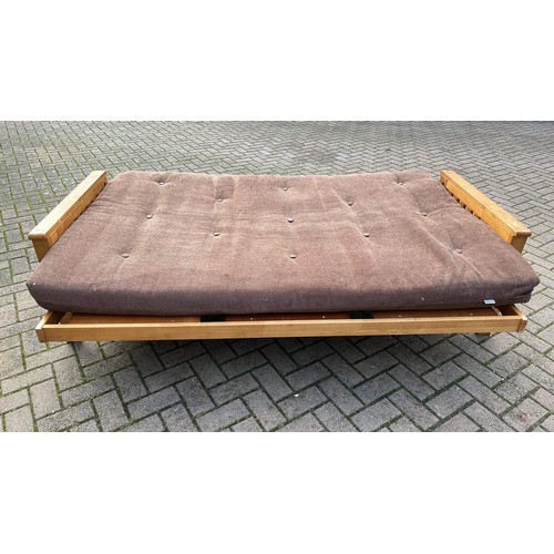 562 - THREE SEATER FUTON SOFA