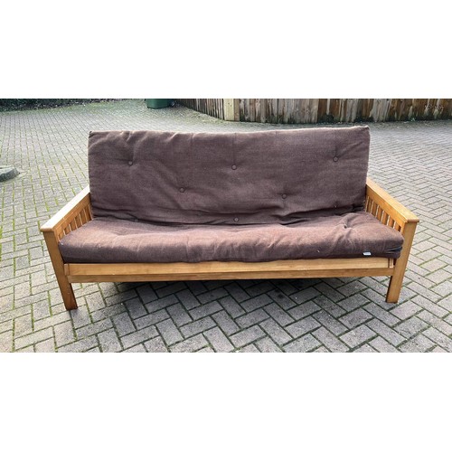 562 - THREE SEATER FUTON SOFA