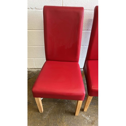 561 - TWO RED DINNING CHAIRS