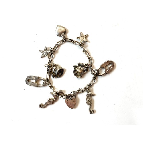 88 - STERLING SILVER CHARM BRACELET