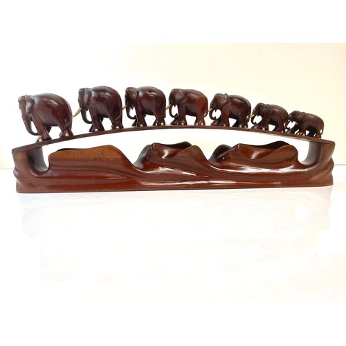 41 - CARVED WOODEN ELEPHANT TROOP 20.5