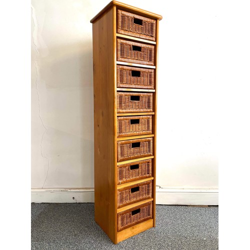 198 - NINE DRAWER PINE AND WICKER WELLINGTON CHEST OF DRAWERS