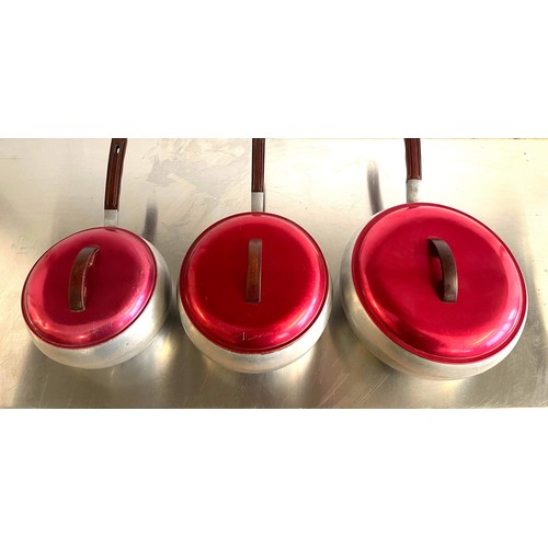 277 - THREE RETRO SAUCEPANS