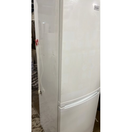 444 - ZANUSSI FRIDGE FREEZER HAS BEEN USED IN A GARAGE HAS MARKS