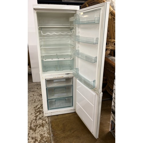 444 - ZANUSSI FRIDGE FREEZER HAS BEEN USED IN A GARAGE HAS MARKS